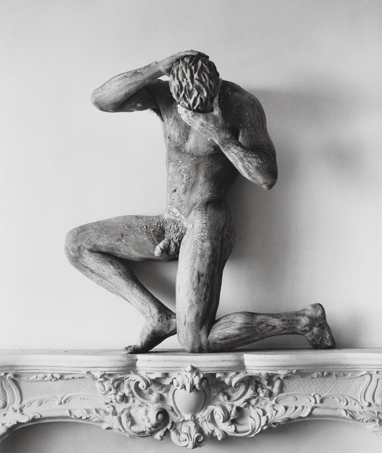 Clay nude on mantle by Herb Ritts, 1989